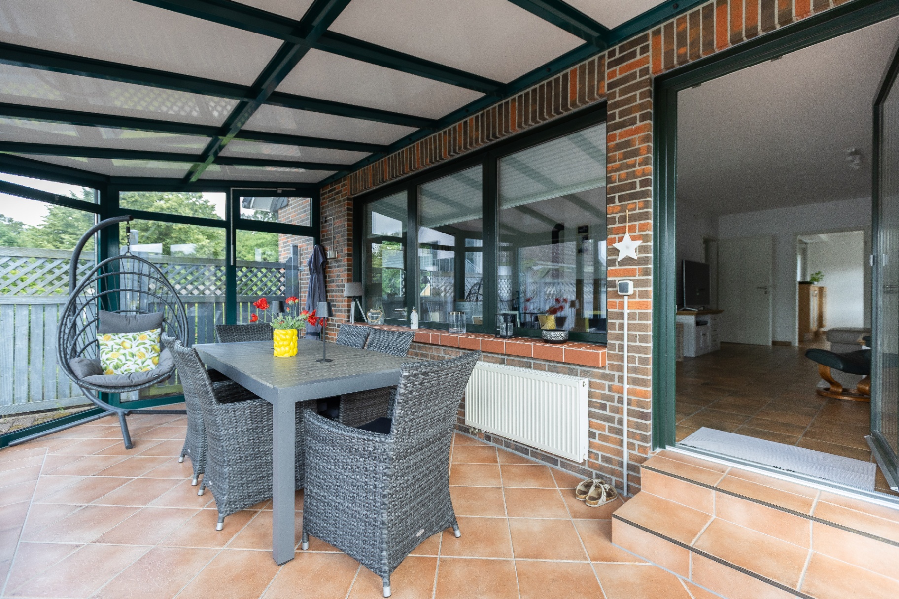 Wintergarten mit Terrasse
